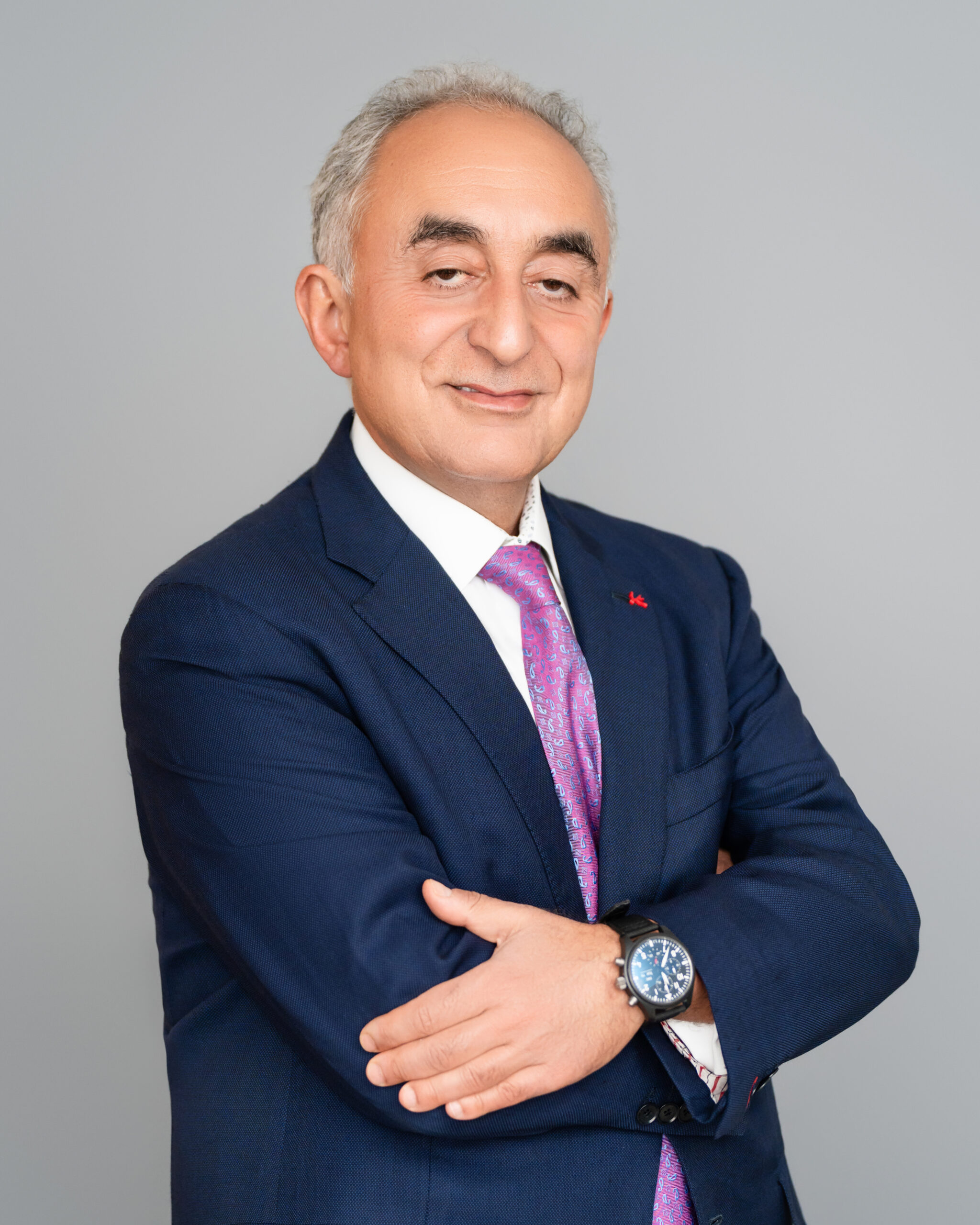 Headshot of Henry Manoucheri, Chairman and CEO